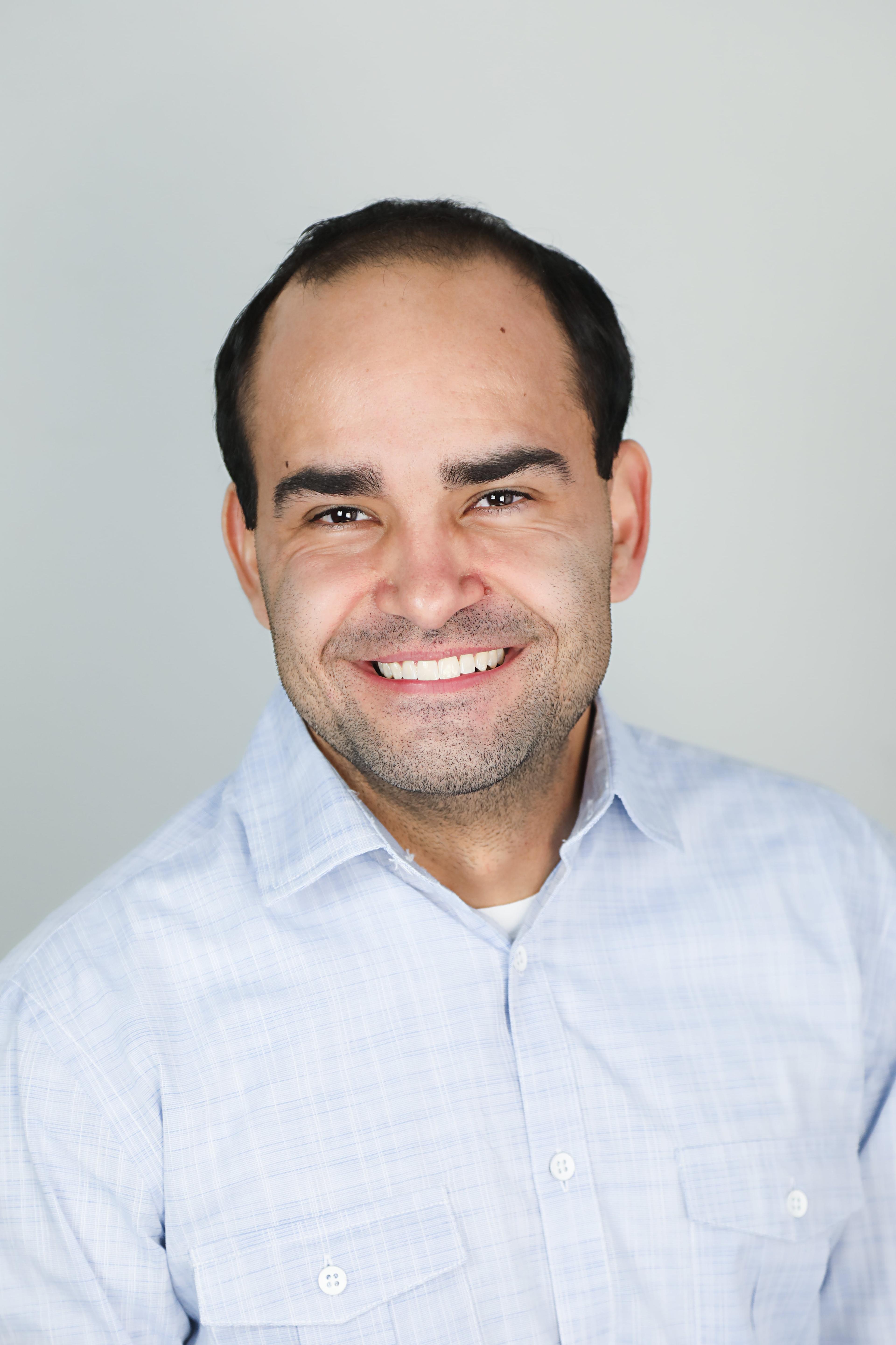 Travis Davis (He/Him)